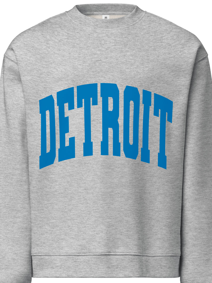 Detroit Game Day Crew Neck Sweatshirt in athletic gray with Detroit printed large across the front in blue. By Pure Detroit.