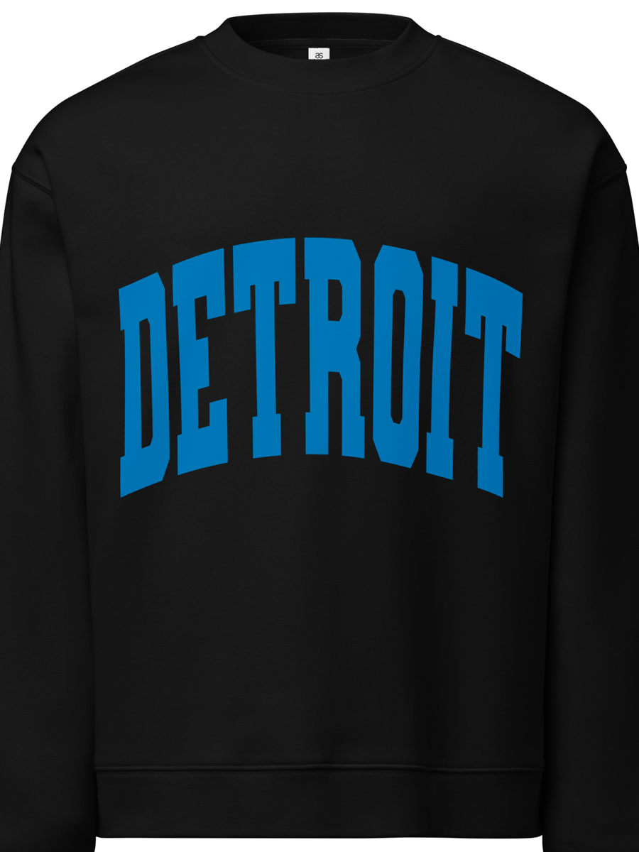 Detroit Game Day Crew Neck Sweatshirt in black with Detroit printed large across the front in blue. By Pure Detroit.